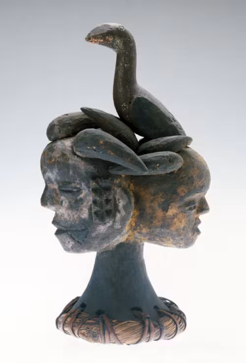 A Janus With Bird Above